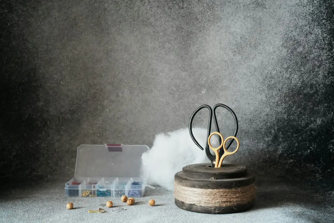 Two pairs of scissors standing in a spool of twine, a nod to cord cutting with MyrixTV