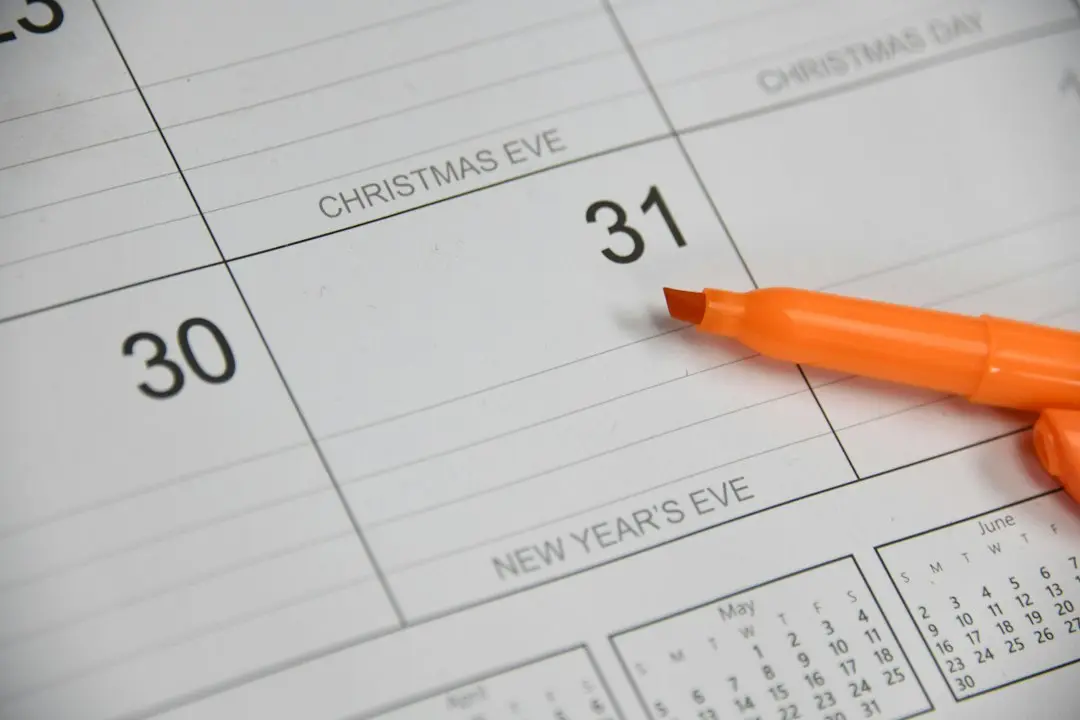 A wall calendar and an orange highlighter at the end of the month, for MyrixTV monthly IPTV